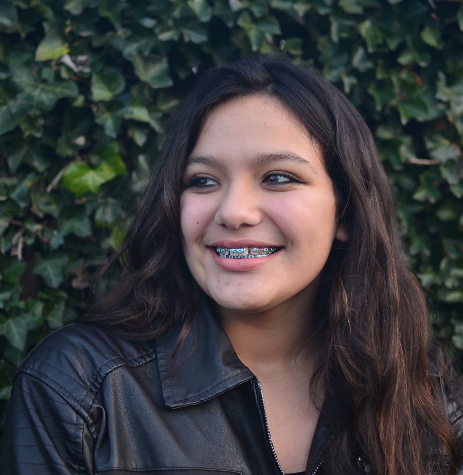 Smiling patient with braces at Rockwood Orthodontics